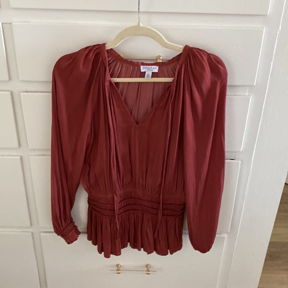 Current air rust colored top with studs on bottom - Picture 2 of 2